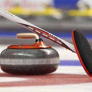 curling rock and sweeper